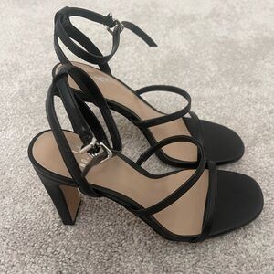 Strapped black heel